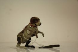 German tinplate windup dog, made in U.S. Zone, with key