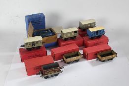Three Hornby Series carriages, all in maroon, together with various boxed O Gauge accessories