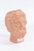20th century terracotta bust in the form of Zeus, 19cm tall