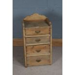 Pine bedside chest of four drawers, with three-quarter shaped upstand and brass handles, 38.5cm