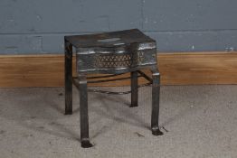 Steel footman, with pierced bow front and side carrying handles, on pad feet, 31cm wide