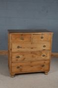 Victorian stripped pine chest, fitted two short over three long drawers, raised on bun feet, 98cm