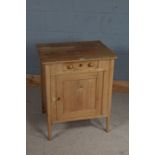 Small pine cupboard, with frieze drawer above a panelled cupboard door, 61.5cm wide