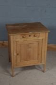 Small pine cupboard, with frieze drawer above a panelled cupboard door, 61.5cm wide