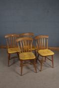 Set of four lath back dining chairs, with solid dished seats, on turned legs and stretchers (4)