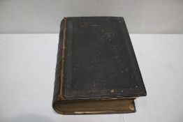 The Family Devotional Bible: containing the old and new testaments, with embossed gilt lather