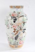 20th century Japanese porcelain vase, painted with wild birds amongst foliage on a white ground,