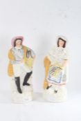 Pair of large 19th century Staffordshire figures 'the fish sellers', approx. 35cm tall (2)