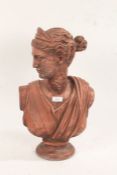 After the antique, a terracotta coloured bust, in the form of Diana, 47cm tall