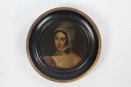 19th century hand painted miniature, depicting a lady wearing a bonnet, painted on papier mache lid,