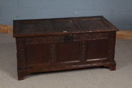George III oak coffer, with triple panelled lid above a foliate lunette carved frieze and triple