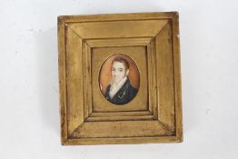 19th century hand painted miniature, depicting a gentleman wearing a green jacket, housed in a
