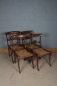 Set of four 19th century faux rosewood dining chairs, each with bar back and scrolling pierced