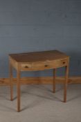 Stripped pine bowfront side table, fitted three drawers, raised on square legs, 83cm wide x 53cm