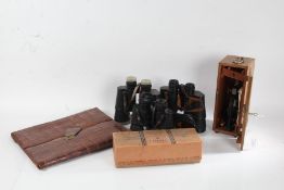 Early 20th Century W. & J Milne leather case, three pairs of binoculars, to include Telstar,