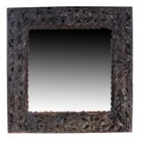 Heavily carved 19th Century oak framed mirror, 70.5cm x 70cm