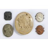 Victorian lava cameo plaques, to include a helmeted figure and four classical figures, the largest