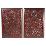 Pair of 19th Century heavily moulded oak panels, decorated with foliate scrolls and fruits, 67cm x