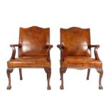 Pair of George III style Gainsborough mahogany armchairs, upholstered in brown leather with
