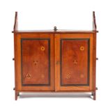 Early 20th Century Aesthetic movement oak, mahogany and inlaid hanging cupboard, the twin door