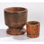 Two 19th Century Indian mortars, the first with a wide bowl above a dumpy column and wide foot,