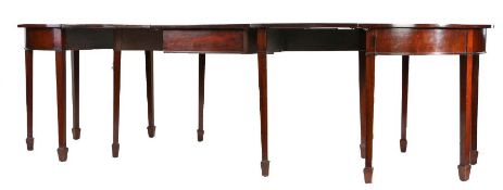 Regency mahogany dining table, the demi lune ends with a central section with gate leg extenders