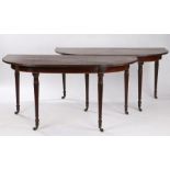 Pair of Regency mahogany demi lune side table, in the manner of Gillows, the shaped top with