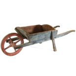 Early 20th Century wheelbarrow, painted in pastel blue and red with a pair of handles before the
