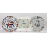 18th Century Delft pottery, to include a polychrome plate with bird in a tree and confirming border,