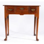 George III oak lowboy, the rectangular top with canted corners above three short drawers and