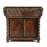 Italian Renaissance walnut cabinet, 17th Century and later, carved frieze flanked by carved rams