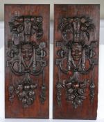 Pair of 17th Century carved oak panels, the long rectangular panels with a central carved bust
