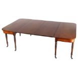 Regency mahogany dining table, the rectangular ends with rounded corners above ring turned and