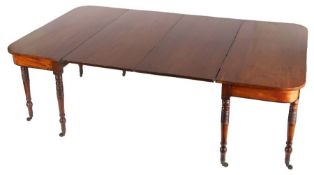 Regency mahogany dining table, the rectangular ends with rounded corners above ring turned and