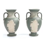 Pair of Mettlach vases, decorated with Pate sur pate depicting classical scenes with arched