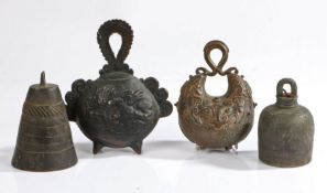A collection of Chinese bronze bells, to include a crescent shaped example with an archaistic