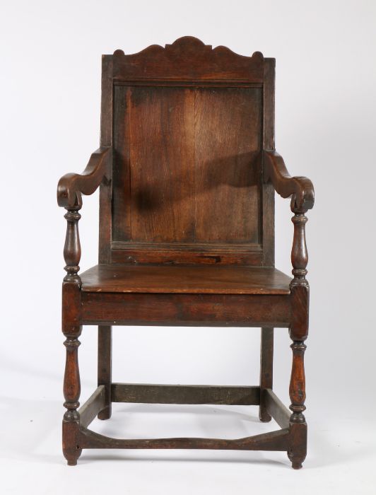 18th Century oak armchair, the arched top rail above a single panel back and solid seat flanked by - Image 2 of 2