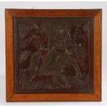 18th Century carved palm wood panel, the carved panel depicting a hunter on horseback with a lance