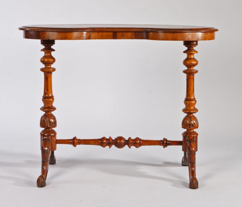 Victorian walnut kidney shaped writing table, the leather inset top above a pair of turned columns - Image 2 of 3