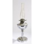 Best British Make oil lamp, with clear glass chimney above a chrome reservoir, stem and stepped
