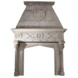 16th Century style stone fire surround, with an heraldic crest showing a rampart lion and two roses,