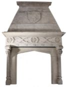 16th Century style stone fire surround, with an heraldic crest showing a rampart lion and two roses,