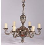 Silver plated six branch chandelier, the tapering harebell decorated stem above six scrolled arms
