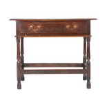 Joined oak side table, English, circa 1700, the rectangular top above a long frieze drawer the