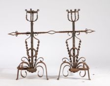 Large pair of fire dogs, the basket tops above a stem and barley twist scrolled supports above