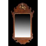 George III mahogany fret wall mirror, the rectangular mirror plate with a gilt and moulded edge