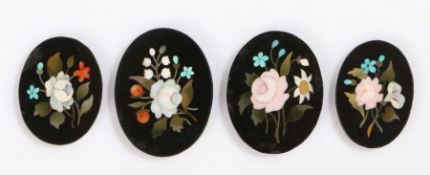 Four 19th Century Pietra Dura inlaid panels, each inlaid with a sprig of flowers, the smallest