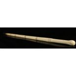 George III whalebone walking stick, circa 1800, the knobbed top above a ring turned tapering