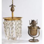 Gilt metal ceiling lamp, with a finial top above a gilt collar and glazz drops, 16cm wide,
