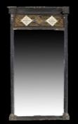 Regency pier mirror, the rectangular mirror plate within the black frame surmounted by a gilt and